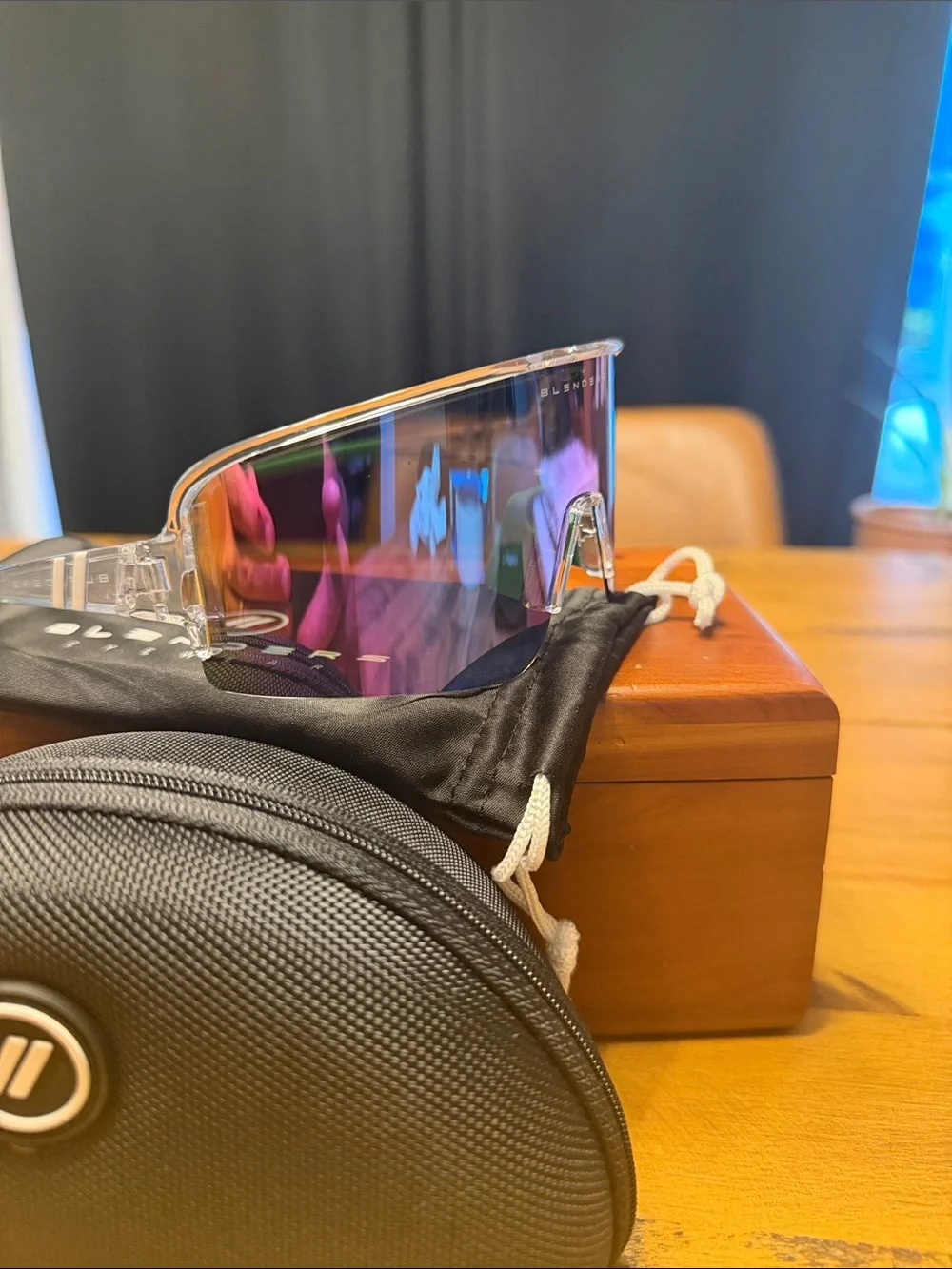 Blenders Polarized Sunglasses Purple iradescent lens with Green stems.